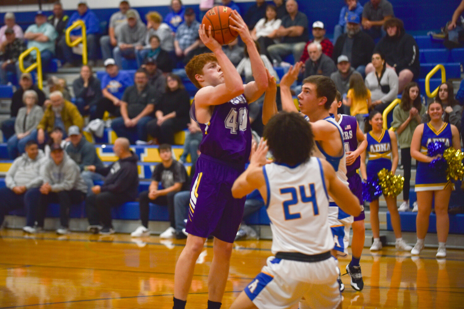 Ethan Thayer takes the ball to the rim during Adna's 78-37 win over Onalaska Dec. 7.